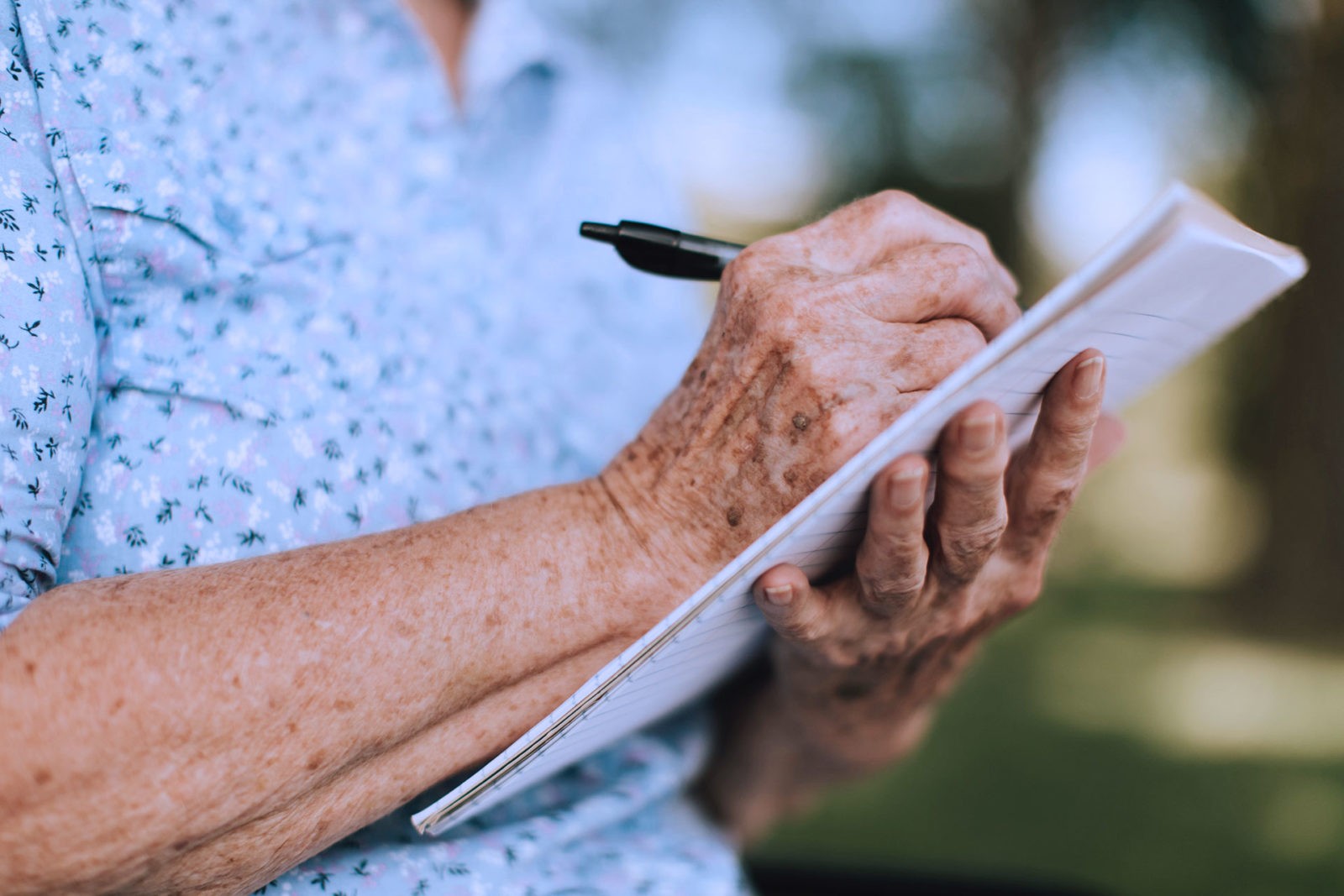 Elderly Woman Writing