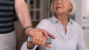 vulnerable elderly adult with cane
